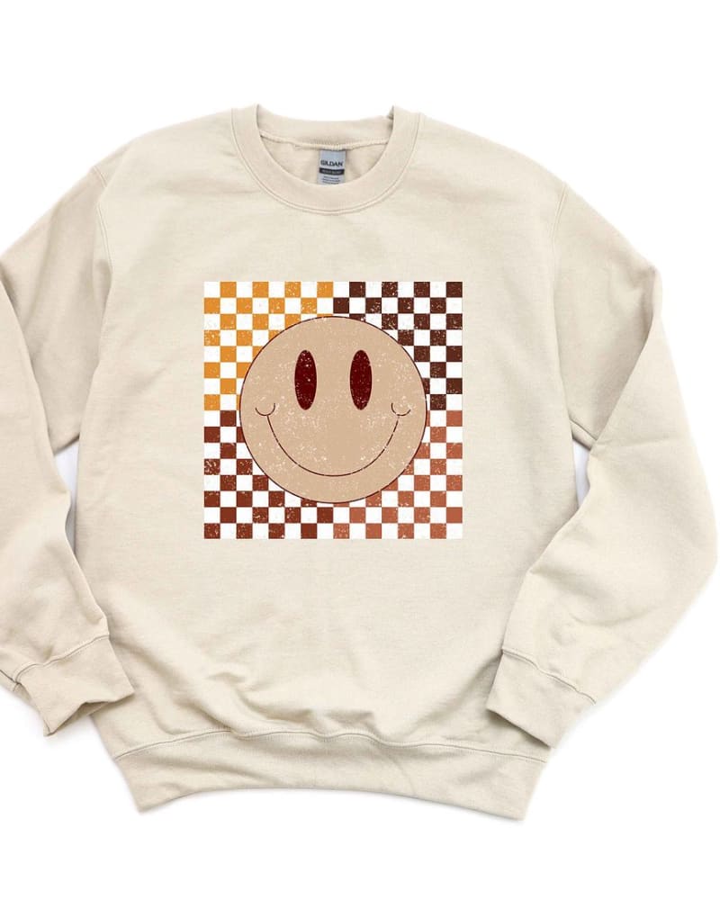 Front of a size L Fall Checkered Smiley Graphic Sweatshirt in Dust by Simply Sage Market. | dia_product_style_image_id:301583